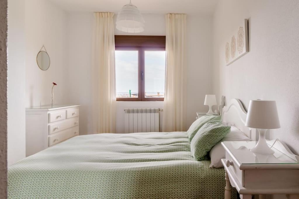 Casa De Las Flores - Apartamento Con Jardin Privado Frente A La Playa De كوميلاس المظهر الخارجي الصورة