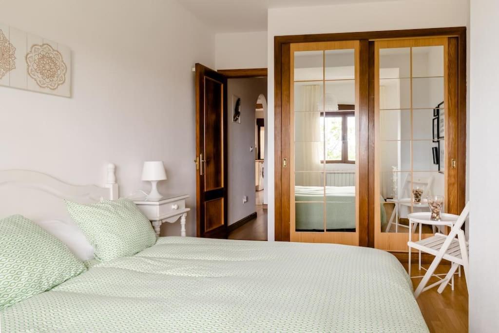 Casa De Las Flores - Apartamento Con Jardin Privado Frente A La Playa De كوميلاس المظهر الخارجي الصورة