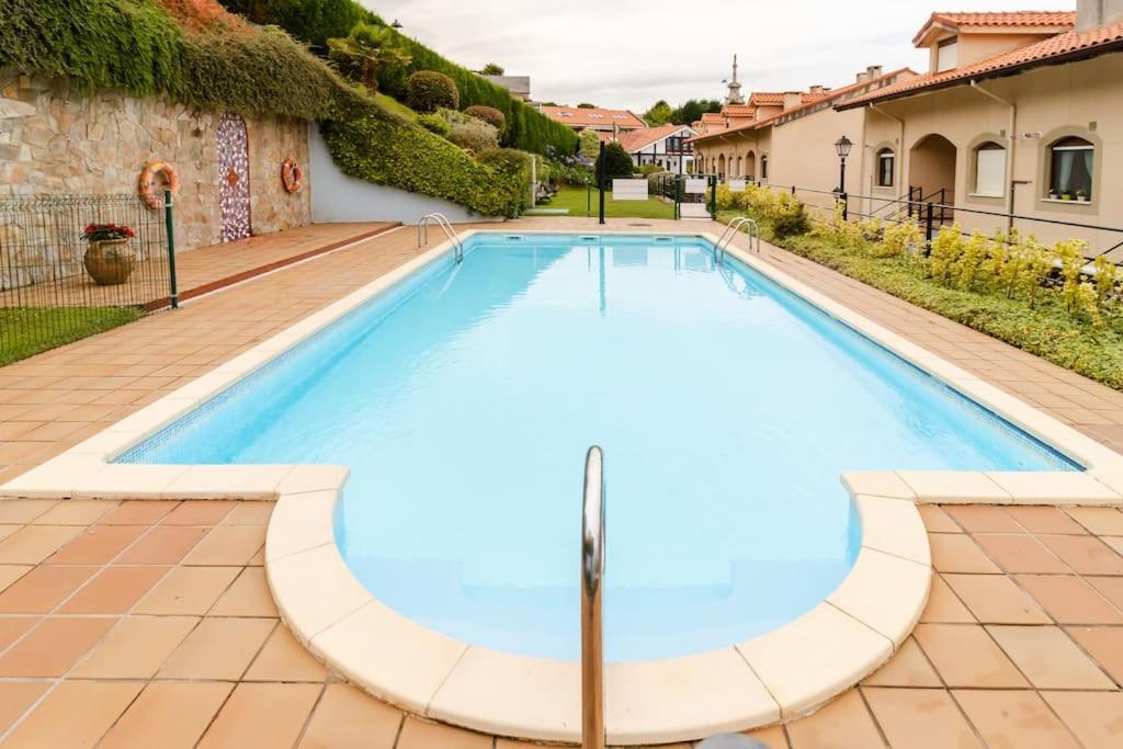 Casa De Las Flores - Apartamento Con Jardin Privado Frente A La Playa De كوميلاس المظهر الخارجي الصورة