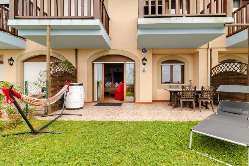 Casa De Las Flores - Apartamento Con Jardin Privado Frente A La Playa De كوميلاس المظهر الخارجي الصورة